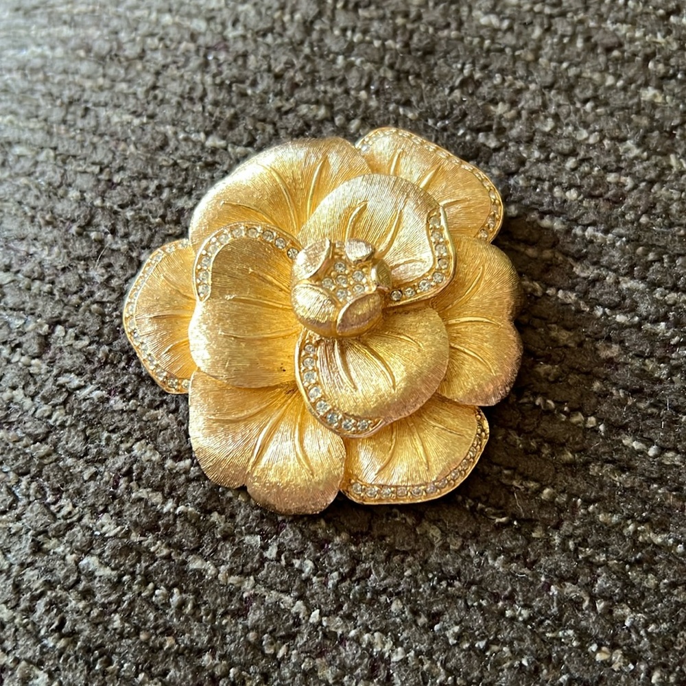 Very detailed flower Christian Dior pin.